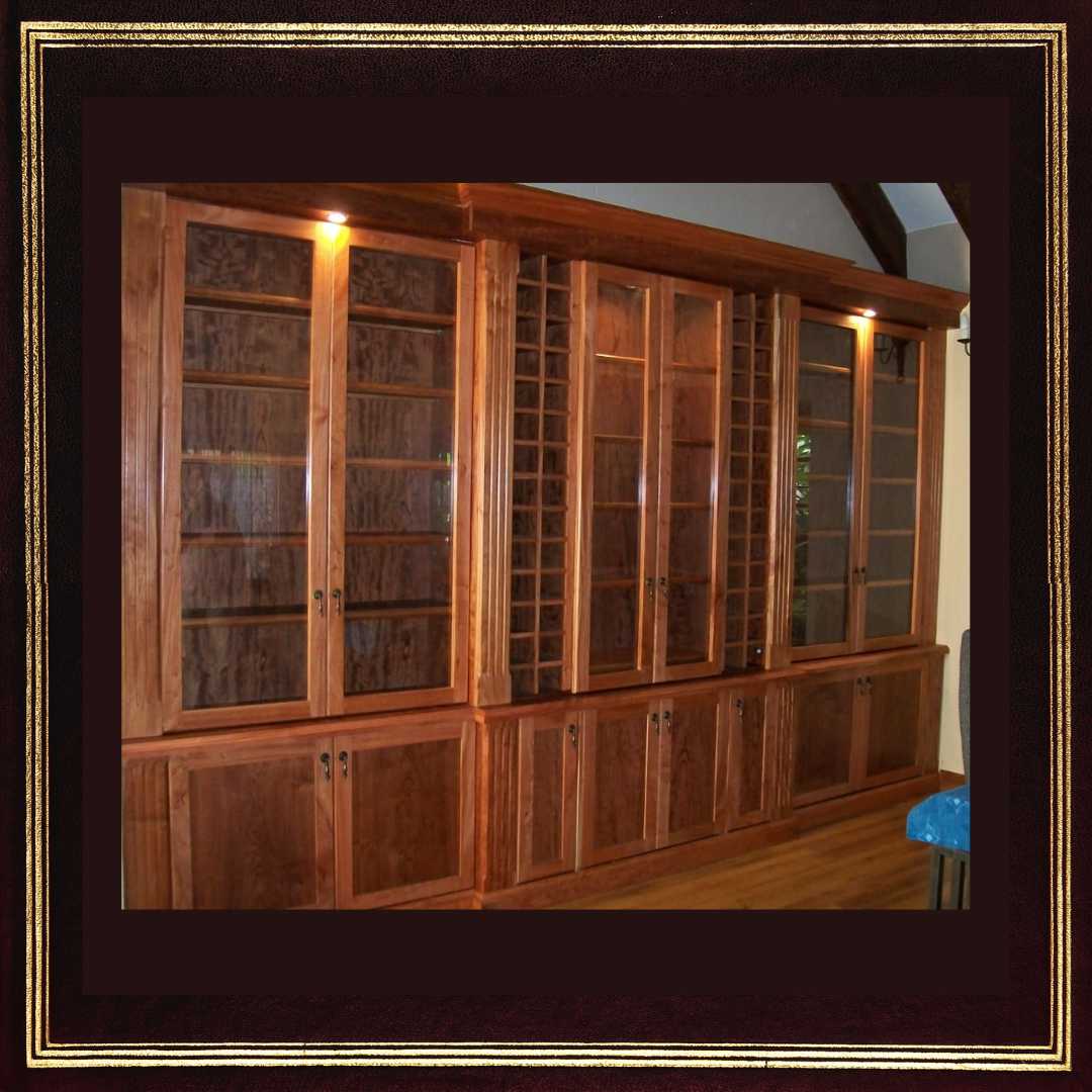 Elevate your home library with this handcrafted bookshelf. Solid wood construction, sleek glass doors, and adjustable lighting enhance the beauty of your books and prized wines.
